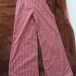Never A Wallflower Women's rust Beetle stripe Print Flare Pants Size XS NWT $264